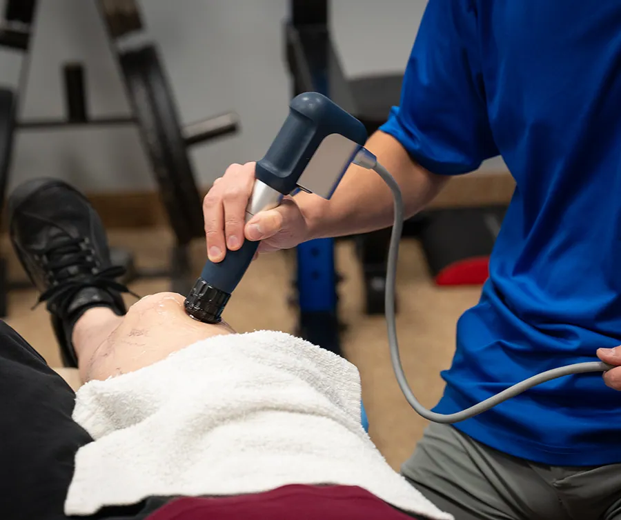 Shockwave therapy applied to a patient’s knee