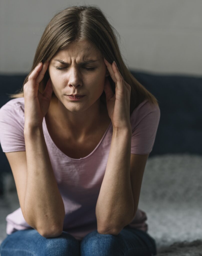 blonde woman experienced headache and migraine pain