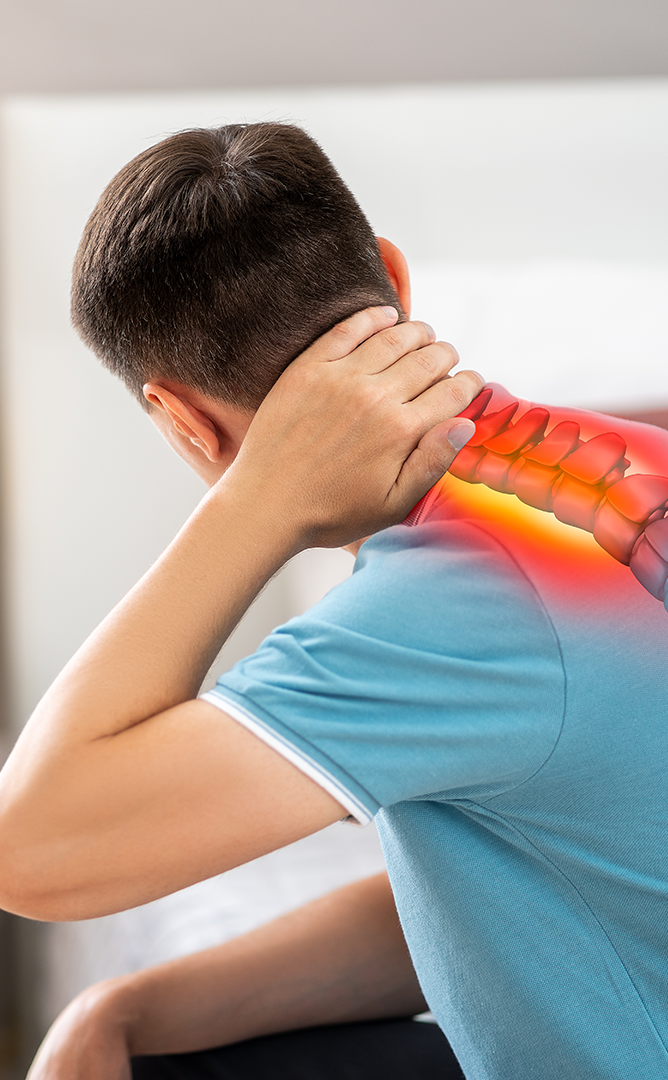 man holding his neck due to pain